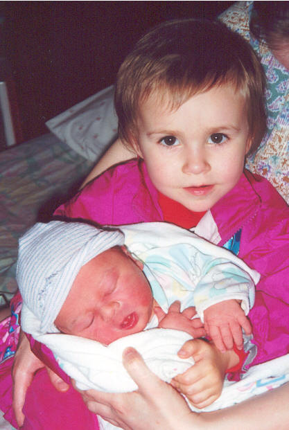 Clara shows off her baby brother.