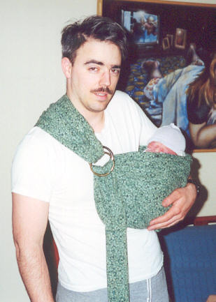 Oliver in sling with Daddy